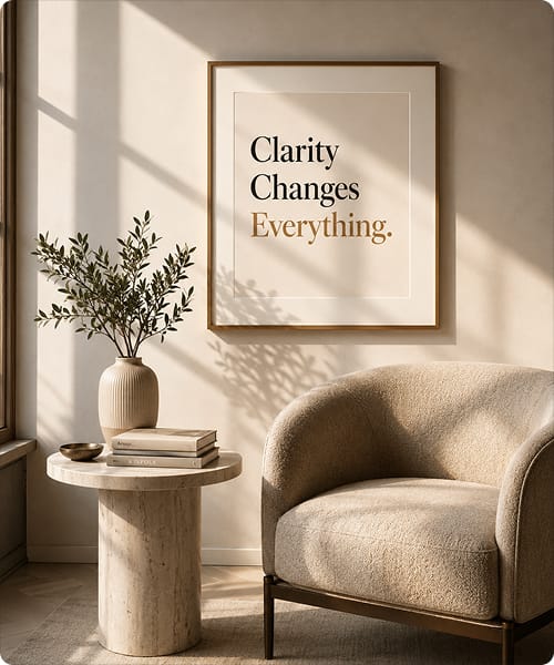 Framed print reading Clarity Changes Everything in a calm, minimal interior